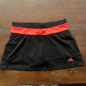 Ladies Adidas Black and Bright Coral Golf Skort